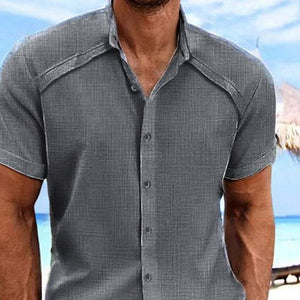 Camisa de manga corta con solapa de color liso de algodón y lino para hombre