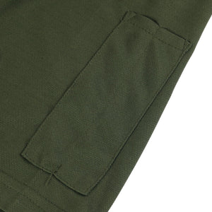 POLO CON CUELLO ABATIBLE DECORATIVO Y CREMALLERA