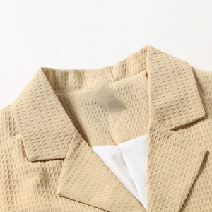 Blazer clásico informal de corte entallado con botonadura sencilla y diseño de gofre para hombre