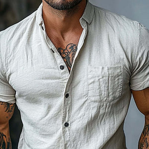 Camisa de manga corta con solapa de algodón de color liso para hombre