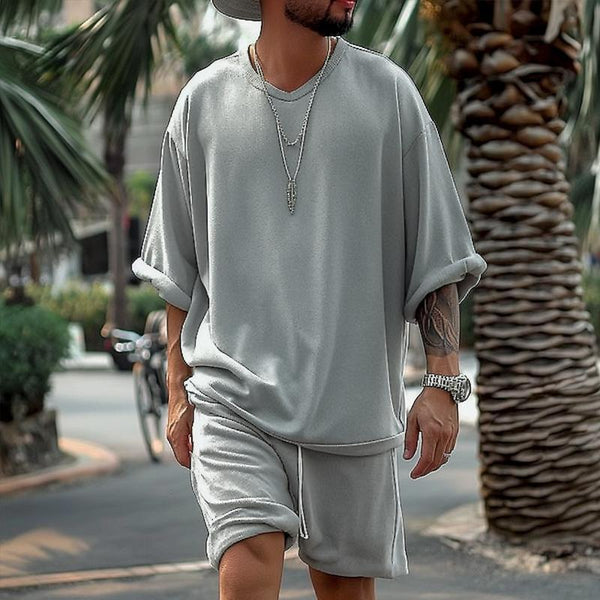 Conjunto casual de camiseta y pantalones cortos de manga corta con cuello en V holgado para hombre