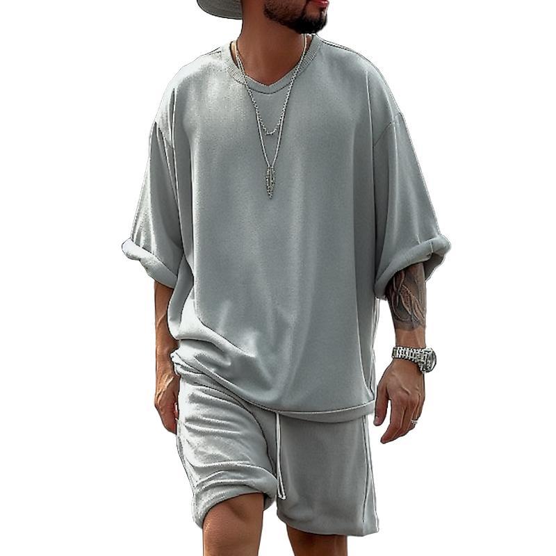 Conjunto casual de camiseta y pantalones cortos de manga corta con cuello en V holgado para hombre