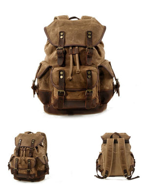 Mochila vintage de lona y cuero con múltiples bolsillos para hombre