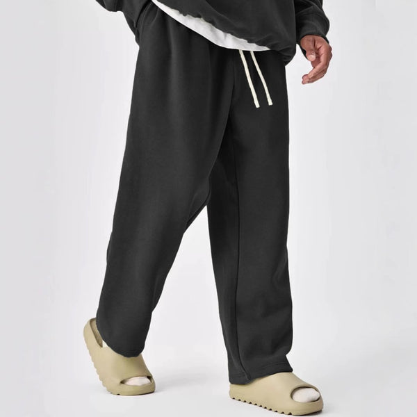 Pantalones deportivos rectos con cintura elástica y cordón de color liso para hombre