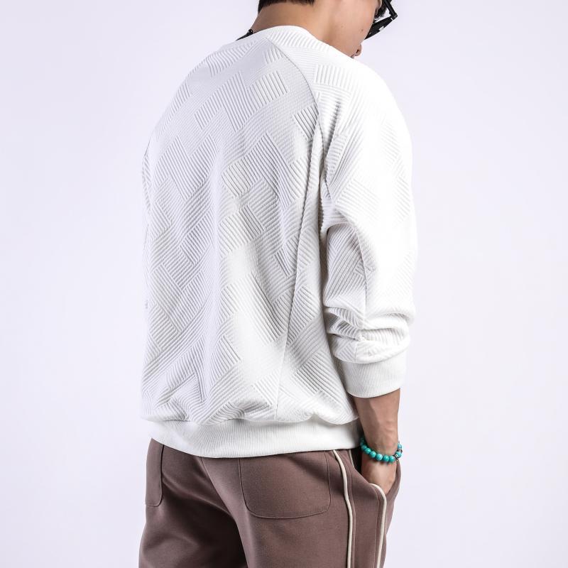 Camiseta de manga larga con cuello redondo y textura de color liso para hombre