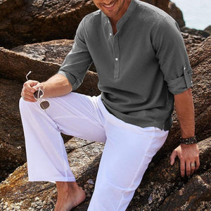 Camisa de manga larga con cuello alto y mangas enrolladas para hombre