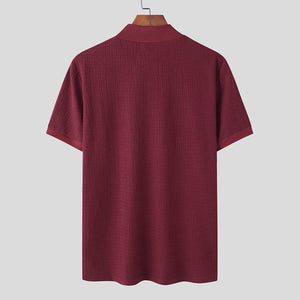 Camiseta de manga corta de punto ajustado de color liso con cuello alto para hombre