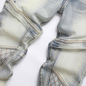 Vaqueros elásticos rotos con parches punk para hombre