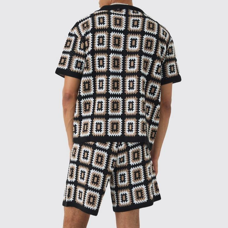 Conjunto de camiseta y pantalones cortos de manga corta de punto calado informal de moda de primavera y verano para hombre