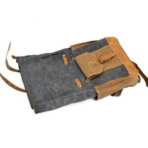 Mochila vintage de lona impermeable con múltiples bolsillos para hombre