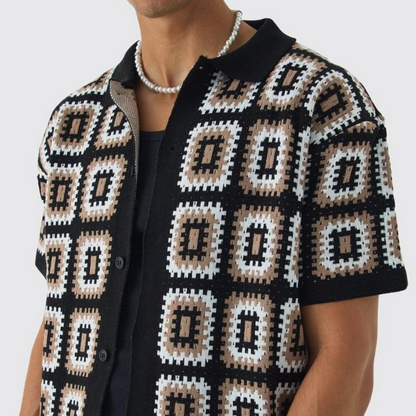 Conjunto de camiseta y pantalones cortos de manga corta de punto calado informal de moda de primavera y verano para hombre