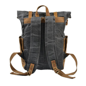 Mochila vintage de lona impermeable con múltiples bolsillos para hombre