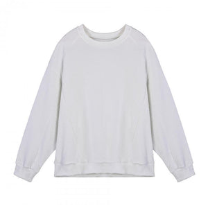 Camiseta de manga larga con cuello redondo y textura de color liso para hombre