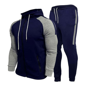 Conjunto de sudadera con capucha y pantalón casual de color contrastante para hombre