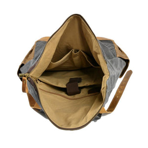 Mochila vintage de lona impermeable con múltiples bolsillos para hombre