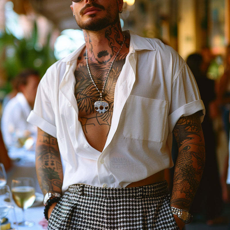 Camisa de manga corta con solapa de algodón liso para hombre