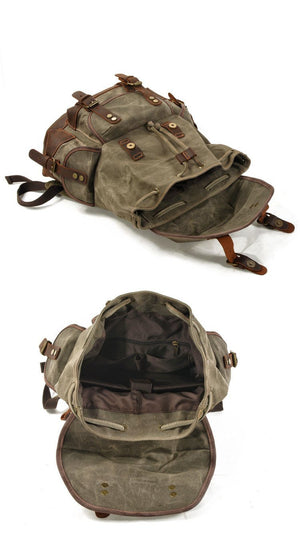 Mochila vintage de lona y cuero con múltiples bolsillos para hombre
