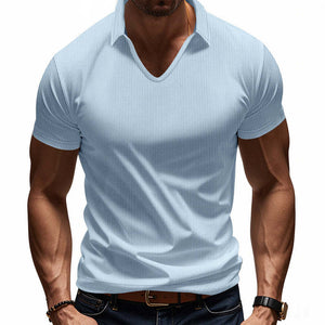 Camisa polo de manga corta con solapa gofre de color liso para hombre