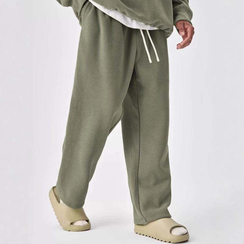 Pantalones deportivos rectos con cintura elástica y cordón de color liso para hombre