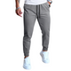 Pantalones casuales de cintura elástica de color liso para hombre 