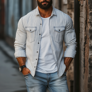 Camisa informal de manga larga holgada con solapa y bolsillo en el pecho a rayas de algodón y lino para hombre