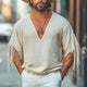 Camiseta informal holgada de algodón y lino con cuello en V profundo y borlas para hombre