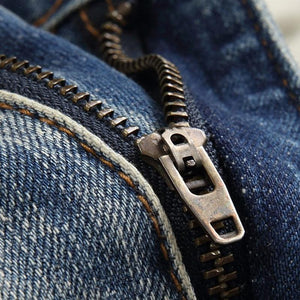 Vaqueros elásticos rotos con parches punk para hombre