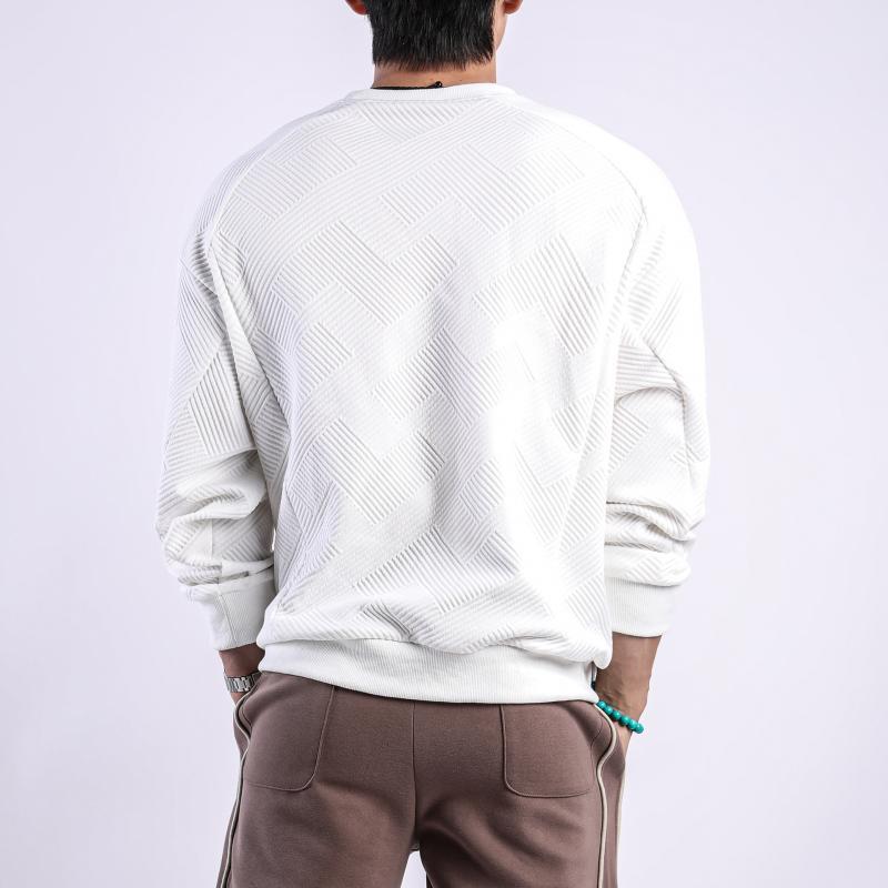 Camiseta de manga larga con cuello redondo y textura de color liso para hombre