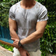 Camiseta vintage de algodón con cuello redondo y manga corta para hombre