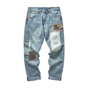 Vaqueros bordados con patchwork para hombre