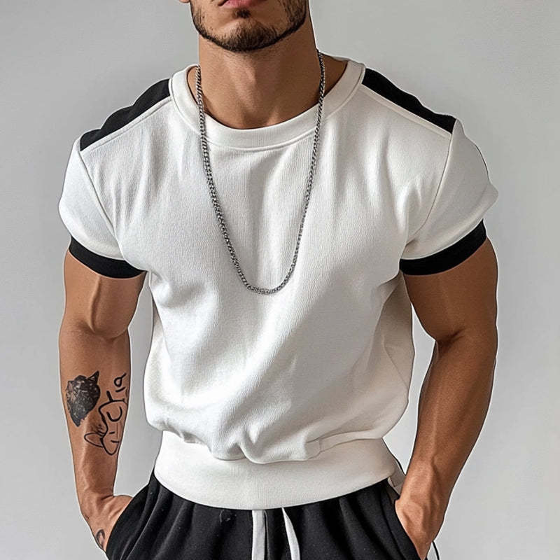 Camiseta deportiva de manga corta con cuello redondo y colores contrastantes para hombre