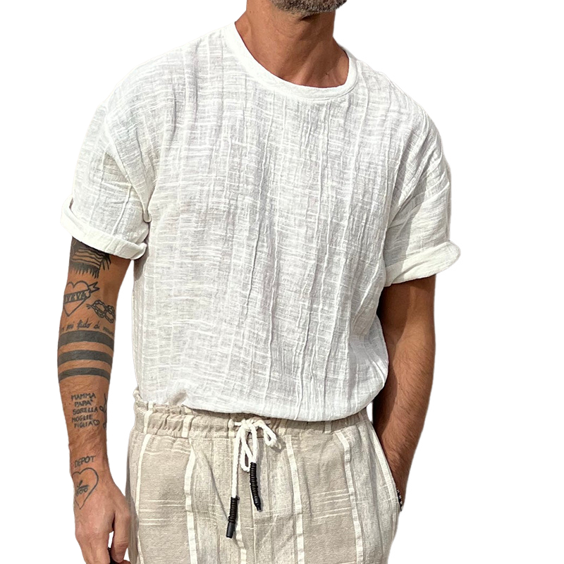 Camiseta de manga corta con cuello redondo y textura de color liso para hombre