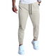 Pantalones casuales de cintura elástica de color liso para hombre 